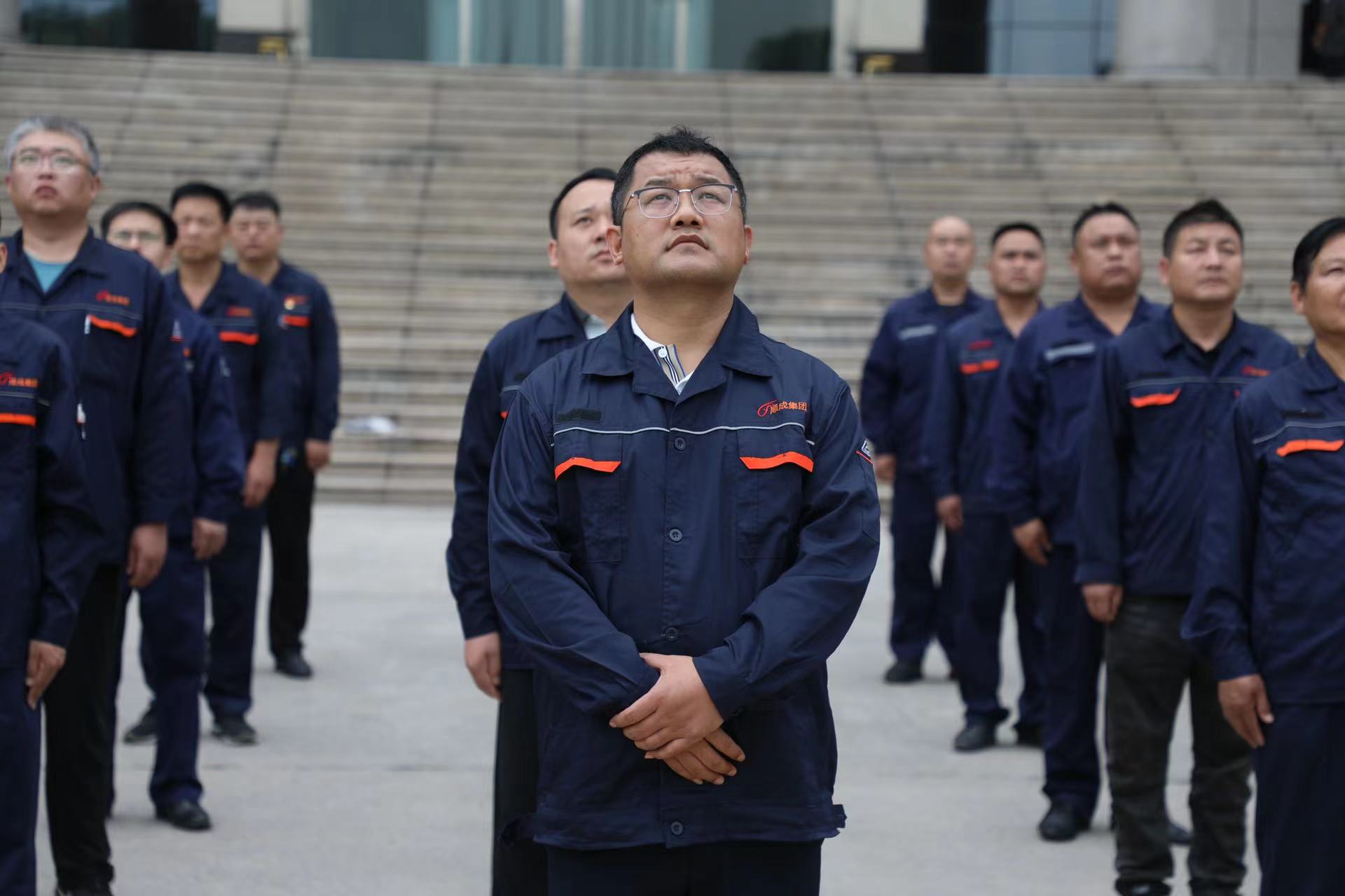 盛大举行纪念建党103周年升旗仪式